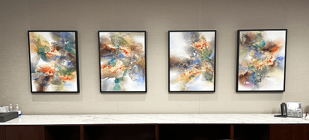 Four abstract paintings on wall