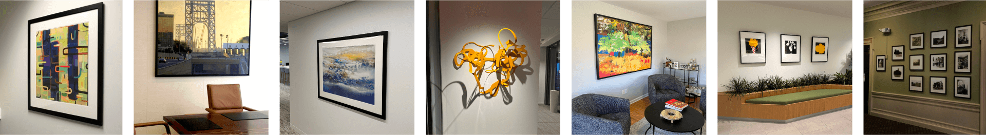 A collage of various art pieces displayed along a hallway, showcasing diverse styles and colors.