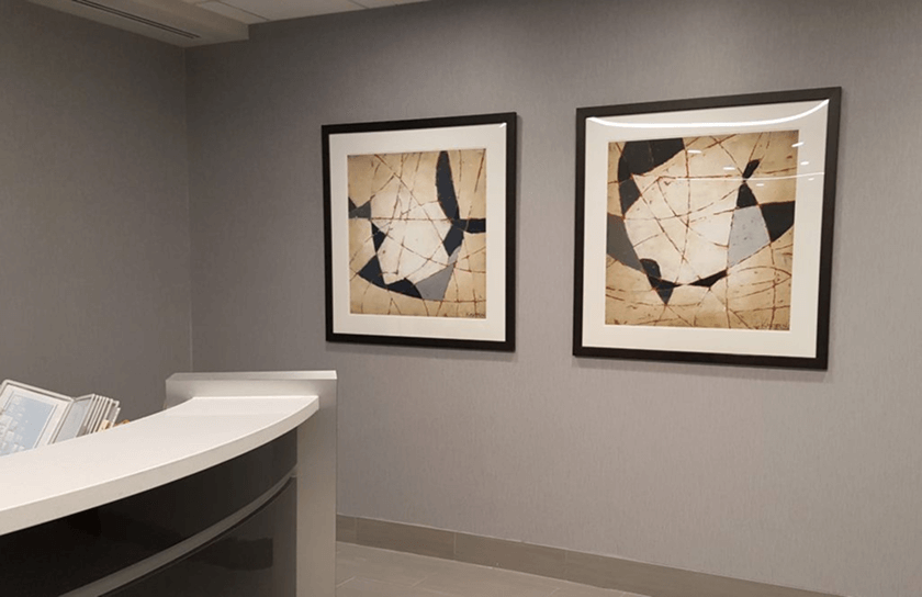 a room with modern abstract arts on wall